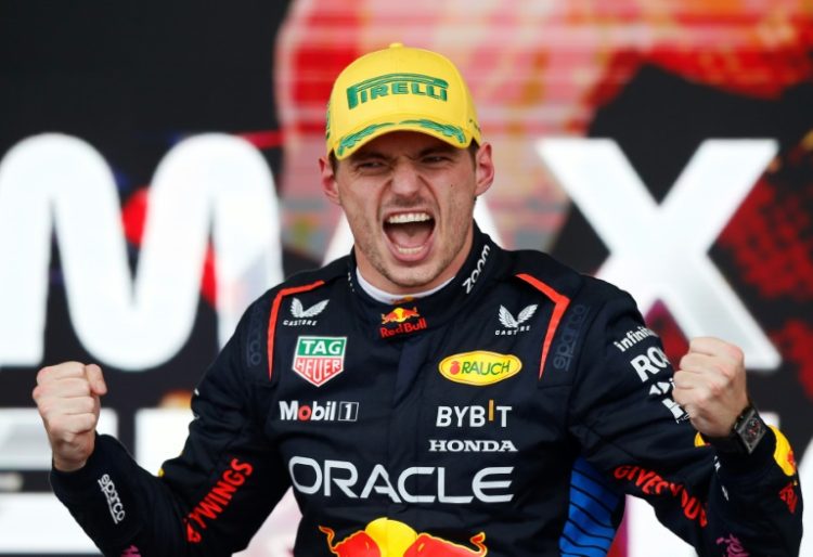 Winning feeling: Max Verstappen celebrates on the podium after victory in Sao Paulo. ©AFP