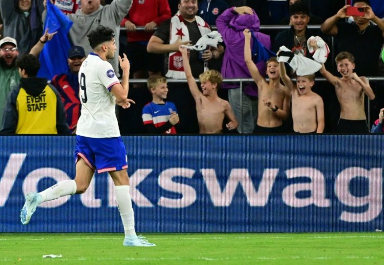 US forward Ricardo Pepi celebrates after scoring his team's third goal in a 4-2 CONCACAF Nations League win over Jamaica. ©AFP