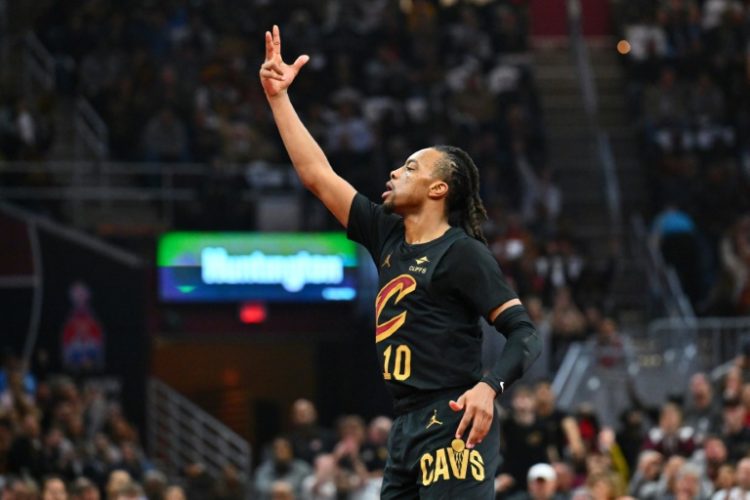 Cleveland's Darius Garland had 25 points and 12 assists to lead the Cavaliers over Charlotte 128-114 to match the second-best start in NBA history at 15-0 . ©AFP