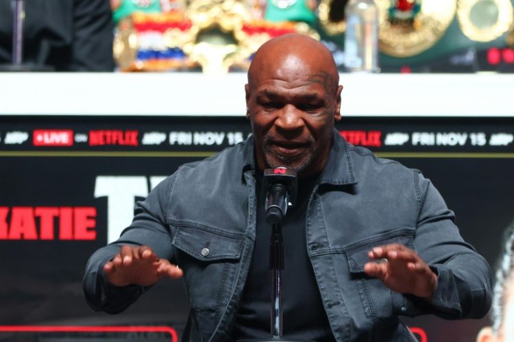 Mike Tyson appears at a press conference on Wednesday ahead of his fight with Jake Paul. ©AFP