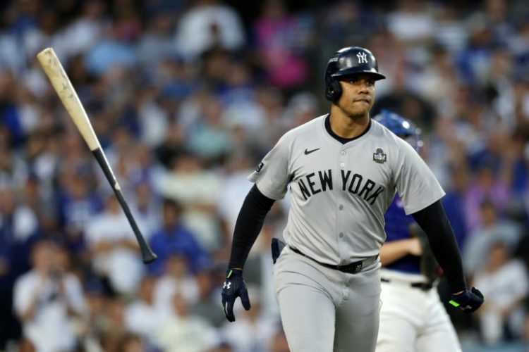 Dominican slugger Juan Soto, who played last season for the New York Yankees, has reportedly signed a 15-year free agent deal worth $765 million with their cross-town rivals, the New York Mets. ©AFP