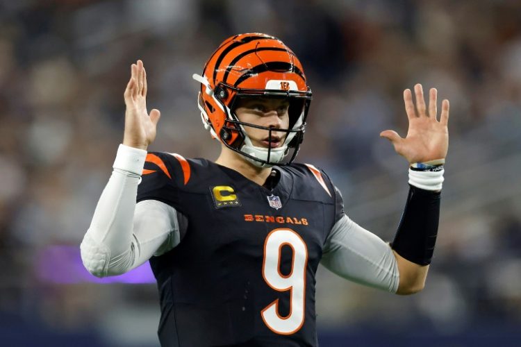 Cincinnati Bengals quarterback Joe Burrow, celebrating a touchdown in a win at Dallas, had a break-in at his home while playing in the NFL contest, according to police. ©AFP