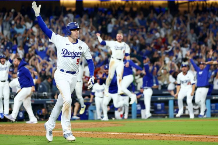 Freddie Freeman's World Series grand slam walk-off baseball has sold for $1.56 million at auction. ©AFP