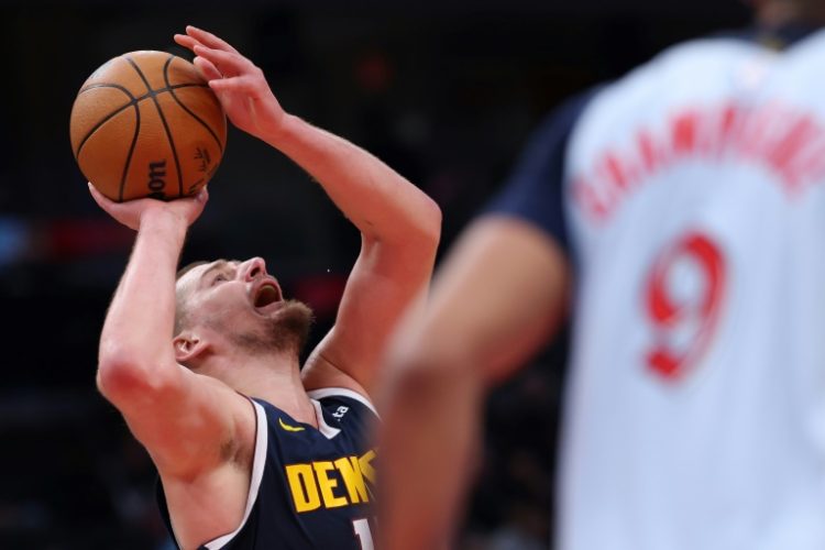 Nikola Jokic scored 48 points in Denver's rout of Atlanta on Sunday, a day after scoring a career-high 56 points in a defeat to Washington. ©AFP