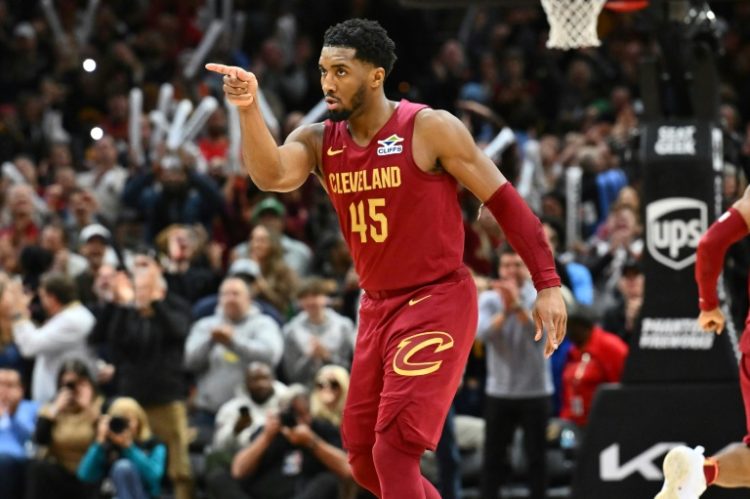 Cleveland's Donovan Mitchell celebrates a Cavaliers basket during in the fourth quarter of an NBA victory over Boston. ©AFP